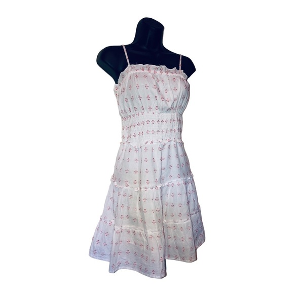 Jessica Simpson Dresses & Skirts - Jessica Simpson white ruffled tiered smocked baby doll‎ mini dress size Medium